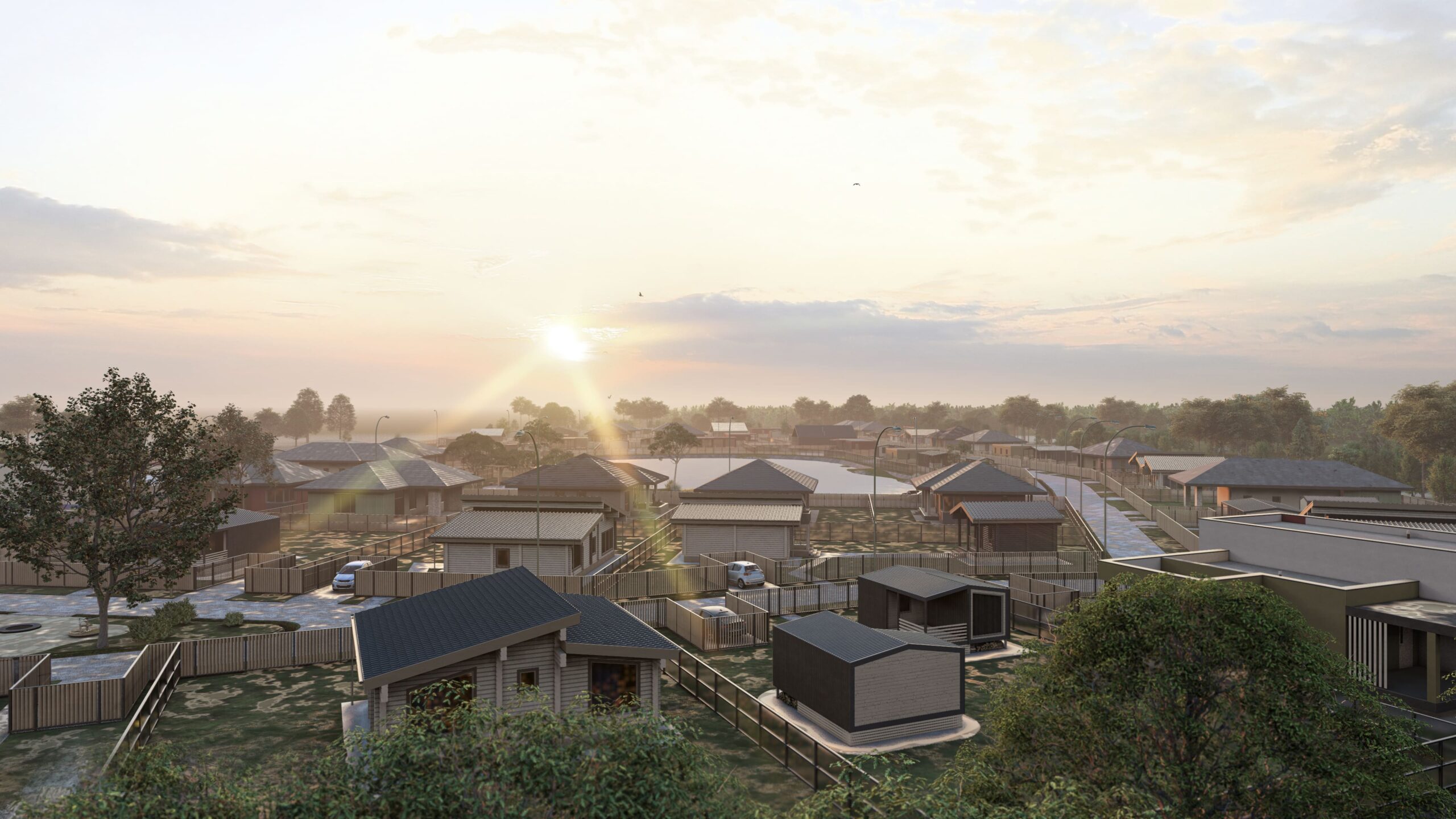 Современный загородный дом и благоустроенная территория в лучах заката